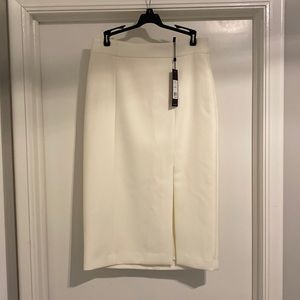 BCBGMAXAZRIA off white just below knee length with slit
